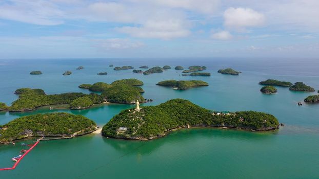 Cluster of small islands in Hundred Islands National Park, Pangasinan, Philippines. Aerial drone: Famous tourist attraction, Alaminos. Summer and travel vacation concept