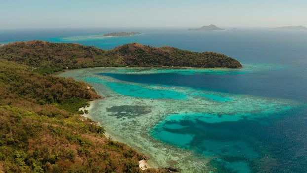aerial seascape tropical beach with white sand and clear blue sea. tropical landscape with islands and beaches. Philippines, Palawan.