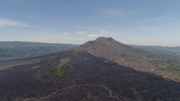 Aerial view landscape after volcanic eruption volcano Batur mountain landscape with volcano sky and clouds Bali, Indonesia. Travel concept.