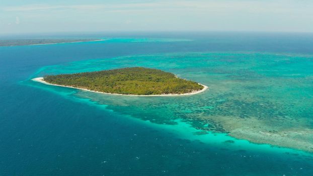 Seascape: Tropical islands with white beaches among atolls and coral reef, top view. Summer and travel vacation concept.