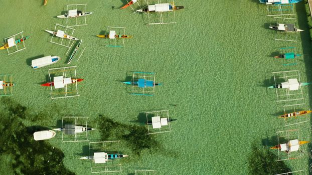 Tourist boats in the turquoise water of the lagoon., aerial view. Summer and travel vacation concept.
