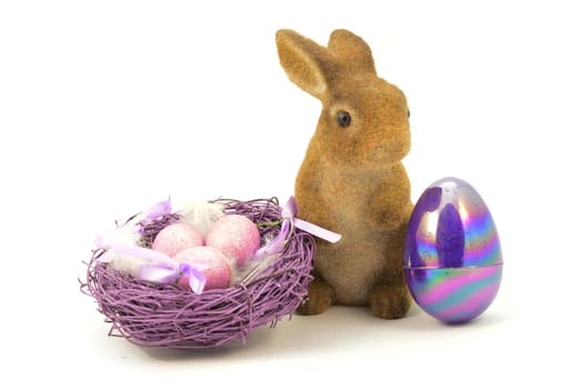 A few Easter themed objects over a white background.