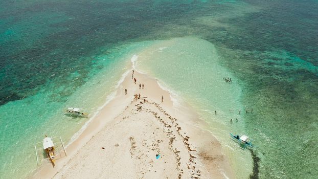 Sandy white island with beach and sandy bar in the turquoise atoll water, aerial drone. Summer and travel vacation concept, Naked Island, Siargao.