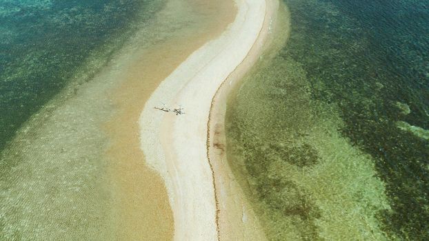 Aerial drone tropical island in blue lagoon with sand bar. Palawan, Philippines. tropical landscape with island and beache