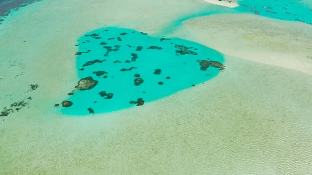 Turquoise lagoon surface on atoll and coral reef, copy space for text. Top view transparent turquoise ocean water surface. background texture