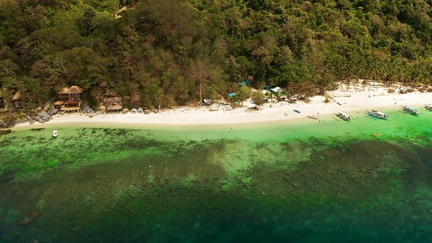 Tropical beach and clear blue water. El nido, Philippines, Palawan. Seascape with tropical rocky islands, ocean blue water. Summer and travel vacation concept