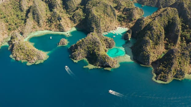 Aerial drone lagoons and coves with blue water among the rocks. lagoon, Kayangan Lake.mountains covered with forests. Seascape, tropical landscape. Palawan, Philippines, Busuanga