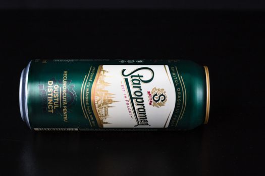 Staropramen  beer can isolated on black background. Bucharest, Romania, 2021