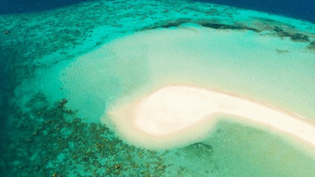 aerial seascape tropical island with sand bar, turquoise water and coral reef. Ditaytayan, Palawan, Philippines. tourist boats on tropical beach. Travel tropical concept. Palawan, Philippines