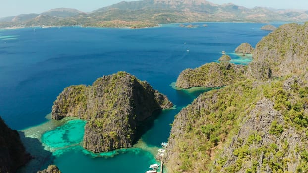 Aerial drone lagoons and coves with blue water among the rocks. lagoon, Kayangan Lake.mountains covered with forests. Seascape, tropical landscape. Palawan, Philippines, Busuanga