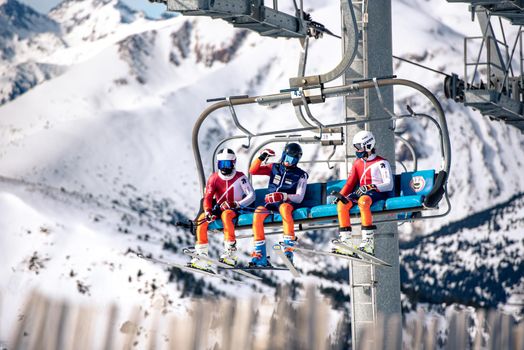 El Tarter, Andorra : 2021 Febraury 2 : Young people on the Chairlift going up to the Grandvalira ski resort in Andorra in 2021
