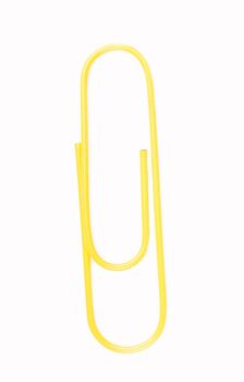 yellow paper clip on a white background