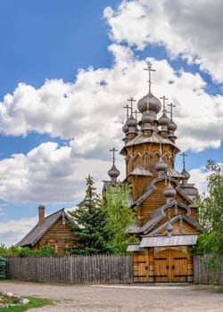 Svyatogorsk, Ukraine 07.16.2020.  Wooden All Saints skete, a part of the Svyatogorsk Lavra in Ukraine, on a sunny summer day