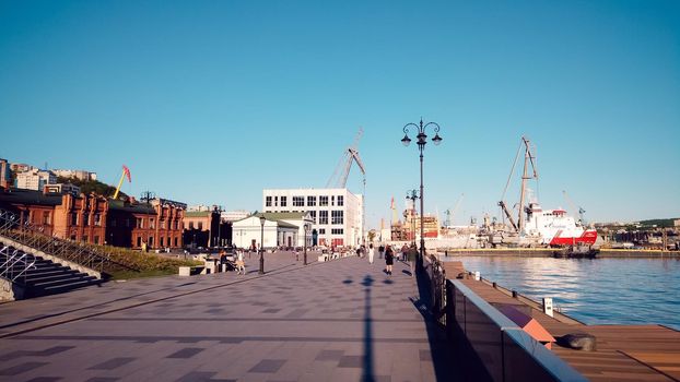 Vladivostok, Primorsky Krai - may 23, 2019: Urban landscape with views of the promenade and people.