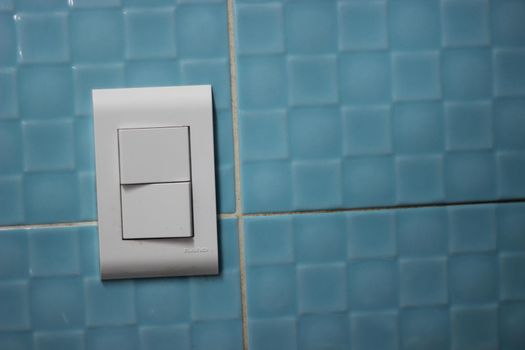 Large size ON OFF light switch button on the wall with copy space.