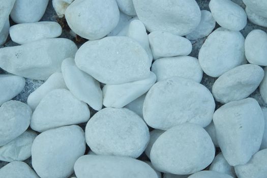 Top view of white stones background.