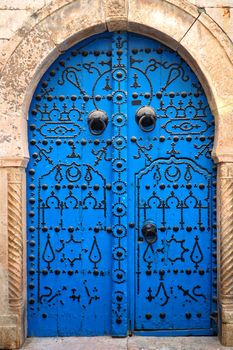 blue door in north african city     