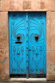 old blue doorway in north african city       