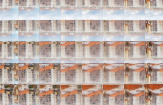 Closeup shot of glass brick also known as glass block texture, abstract background.