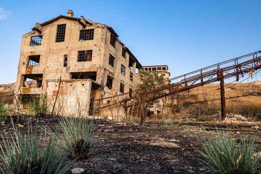 Abandoned buildings and machinery of the mining complex Trabia Tallarita in Riesi, near Caltanissetta, Italy