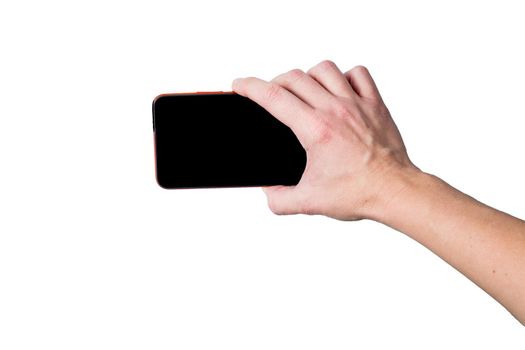 Female hand holding smartphone with black screen taking photo, isolated on white background, free space, mockup for designer