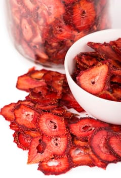 dry strawberry in a white plate it is isolated