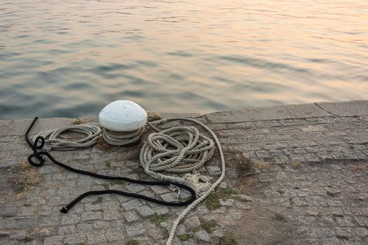 Mooring and bollard on the pier. Stock photo