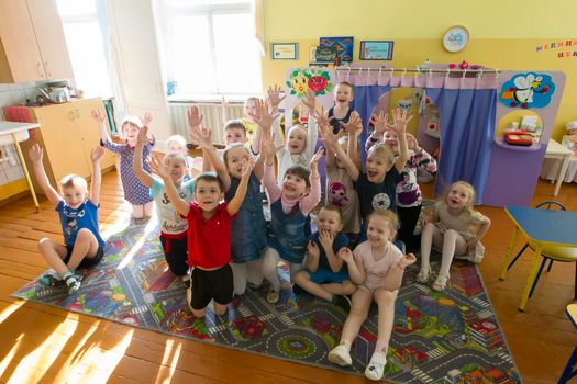 Belarus, the city of Gomil, April 25, 2019.Open day in kindergarten. Many children in kindergarten. A group of six year old boys and girls.