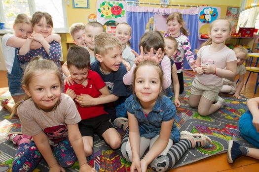 Belarus, the city of Gomil, April 25, 2019.Open day in kindergarten. Many children in kindergarten. A group of six year old boys and girls.