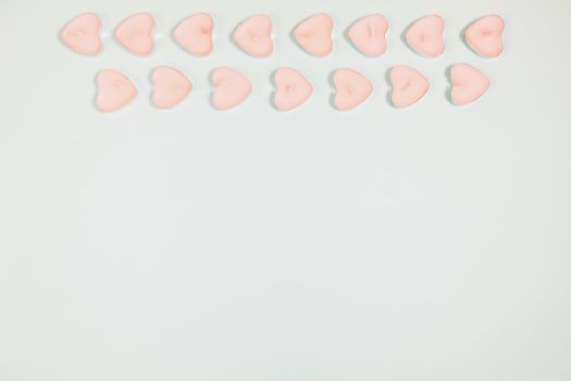 Valentine's Day, composition of hearts on a blue background. View from above. Space for text, flat lay