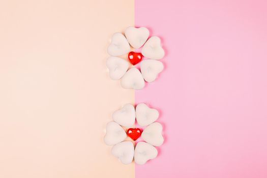 Valentine's Day, composition of hearts on a pink background. View from above. Space for text, flat lay