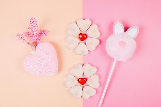 Valentine's Day, composition of hearts on a pink background. View from above. Space for text, flat lay