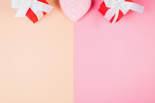 Valentine's Day, composition of hearts on a pink background. View from above. Space for text, flat lay