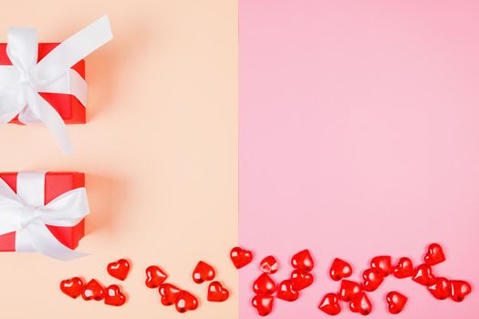 Valentine's Day, composition of hearts on a pink background. View from above. Space for text, flat lay