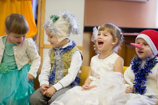 Belarus, the city of Gomil, December 27, 2018. Morning party in kindergarten.Cheerful children at the Christmas carnival.