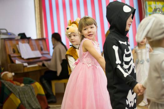 Belarus, the city of Gomil, December 27, 2018. Morning party in kindergarten.Children from kindergarten are dancing at the Christmas holiday.
