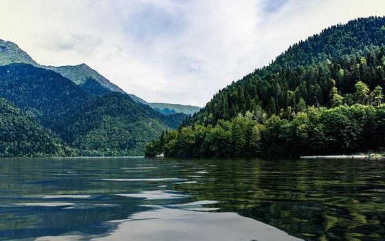 Natural landscape with lake Ritsa and beautiful mountains