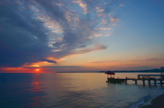 Seascape at sunset with heavy storm clouds in the sky