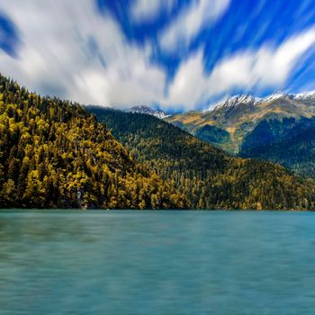 Ritsa, Abkhazia. The magnificent mountain scenery on the background of emerald lake Ritsa in Abkhazia