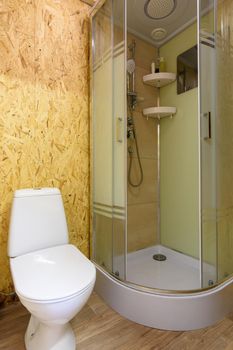 The interior of a modest small bathroom in a country house