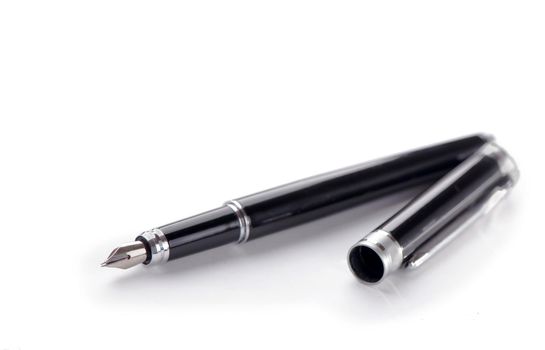 Close op elegant black fountain pen on white background