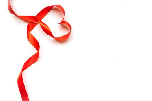 Top view of ribbon shaped as heart isolated on white background. Valentine's day concept. Copyspace