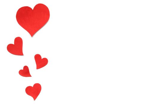 Valentines Day card background, border of red cute hearts made of paper. White background with hearts in paper cut in different size. Valentine Day romantic. Copyspace