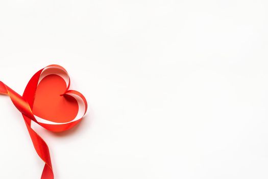 Top view of ribbon shaped as heart isolated on white background. Valentine's day concept. Copyspace