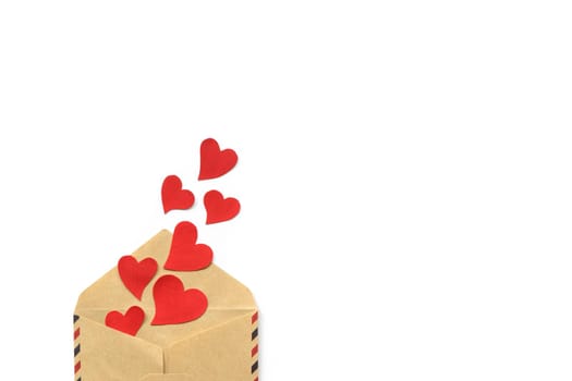 Valentines day, red hearts from the craft envelope isolated on white background. Love concept. 14 february. Copyspace