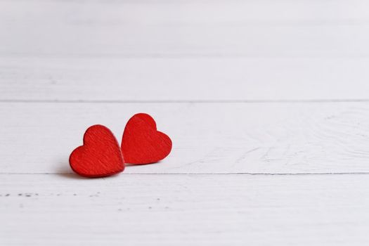 Valentines day card with red hearts on a wooden background, love message. Love concept. Romantic. Copyspace