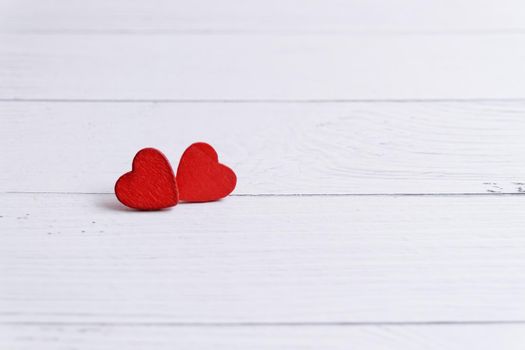 Valentines day card with red hearts on a wooden background, love message. Love concept. Romantic. Copyspace