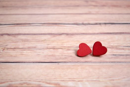 Valentines day card with red hearts on a wooden background, love message. Love concept. Romantic. Copyspace