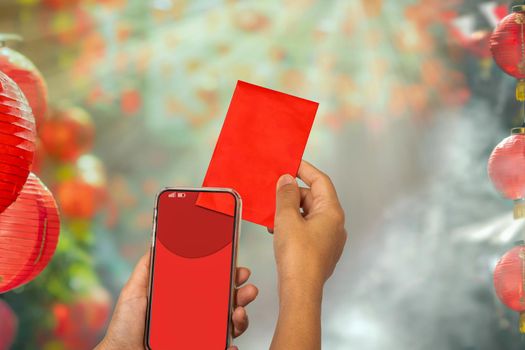 Chinese new year , Digital Hongbao or red envelope  are sending on cellphone.