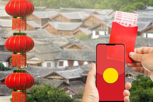 The digital hongbao on cell phone in chinese lunar new year. 
distribute money in paper red packets to family